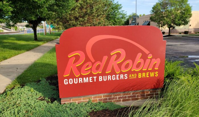 Sign for Red Robin Gourmet Burgers and Brews - stella artois class action
