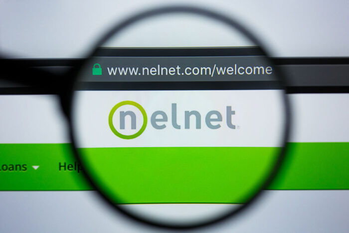 Illustrative Editorial of NELNET.COM website homepage. NELNET logo visible on display screen.