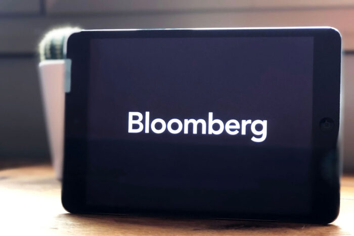 Close up of Bloomberg company logo on tablet screen.