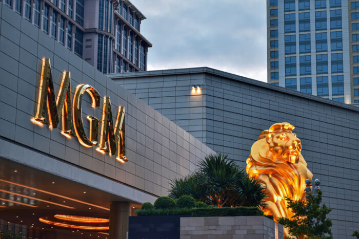 Exterior of a MGM resort against a cloudy gray sky.