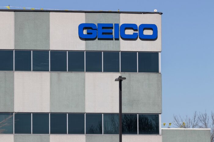 GEICO Insurance office. GEICO is a subsidiary of Berkshire Hathaway - class action