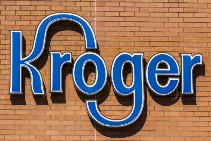 Close up of Kroger signage on a brick wall, representing the Kroger class action.