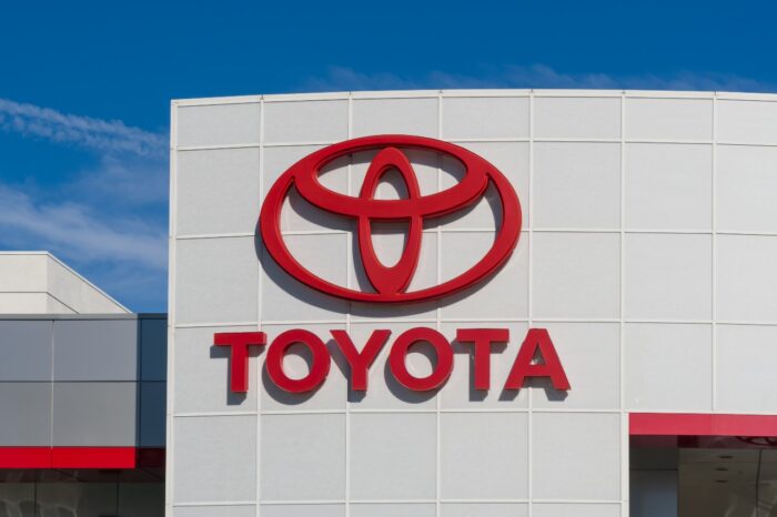 Toyota automobile dealership sign. Toyota is a multi-national Japanese automotive manufacturer.