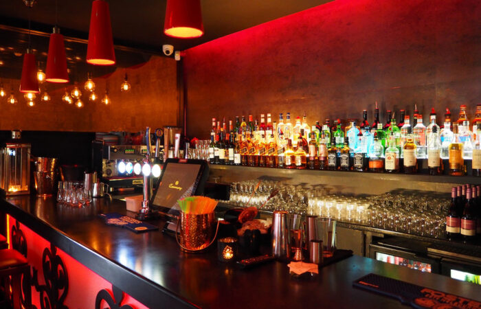 Bar area inside of a food restaurant.