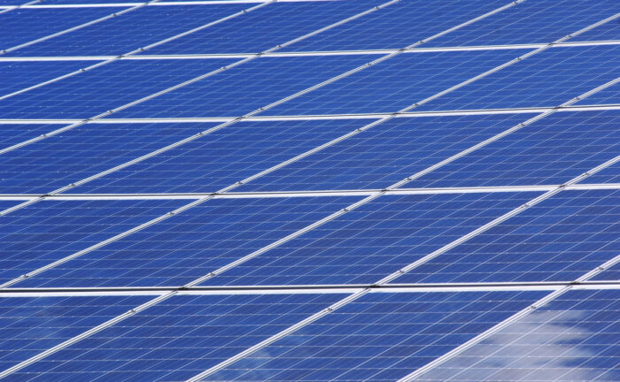 Close up of solar panels on a rooftop.