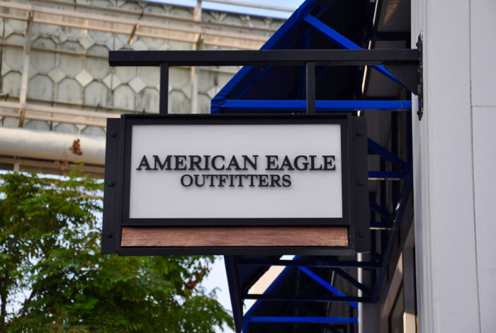 Sign of American Eagle Outfitters in front of the store.