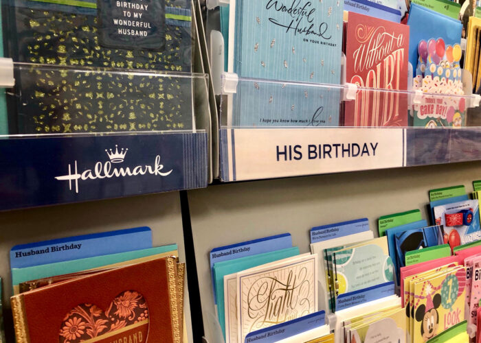 Hallmark greeting card aisle at supermarket - class action, text messages