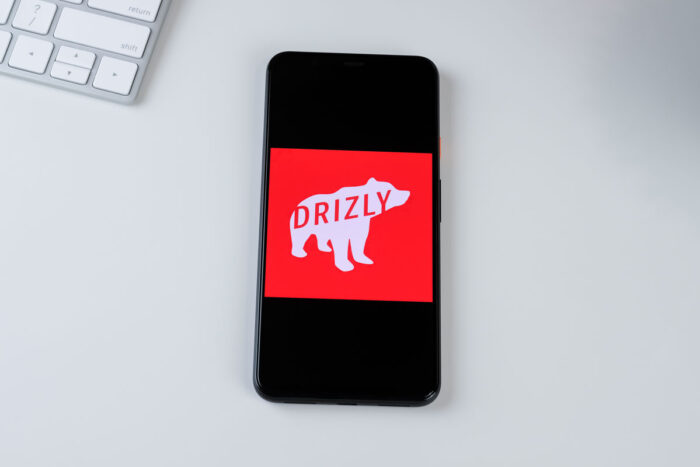 Drizly app logo on a smartphone screen.
