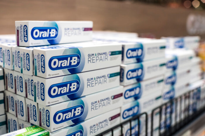 Oral-B toothpaste on display at an aisle in a supermarket - Oral-B text messages class action