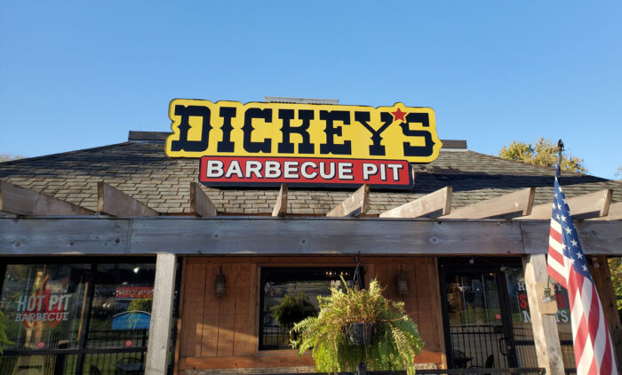 Dickey's BBQ location against a blue sky.