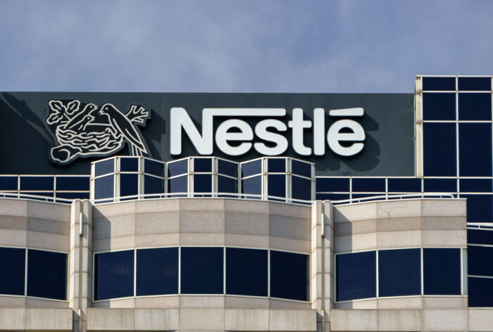 Close up of Nestle signage on exterior of its headquarters building in the USA.