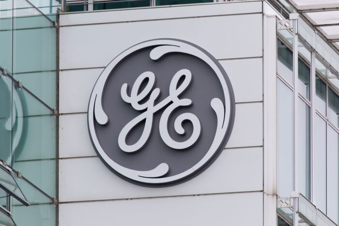 Close up of GE logo on exterior of building - general electric lawsuit