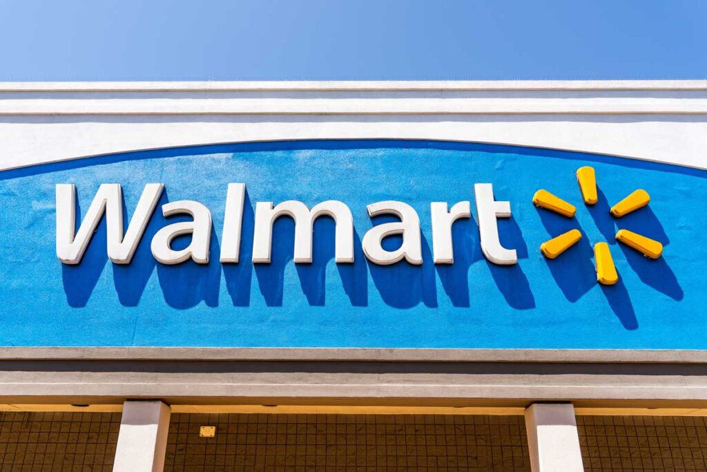 Close up of Walmart logo displayed on the facade of one of their supercenters in South San Francisco.