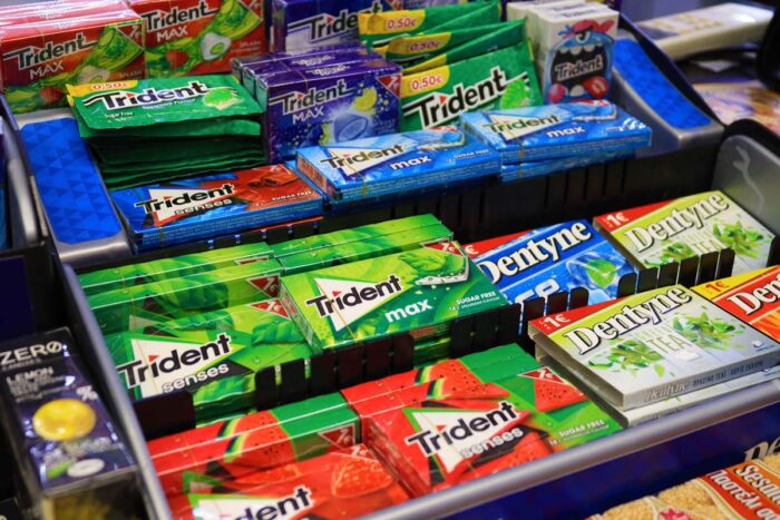 Close up of Trident gum on a grocery store shelf.