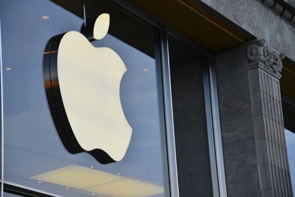 Close up of Apple logo outside of an Apple Store.