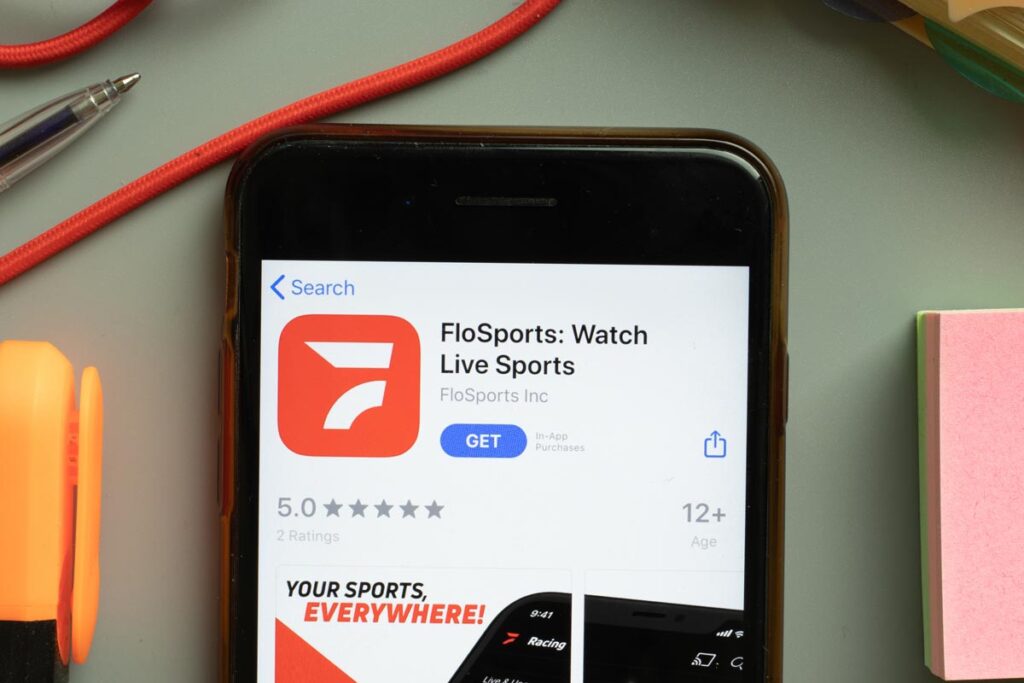 FloSports Watch Live Sports mobile app logo on phone screen close up.