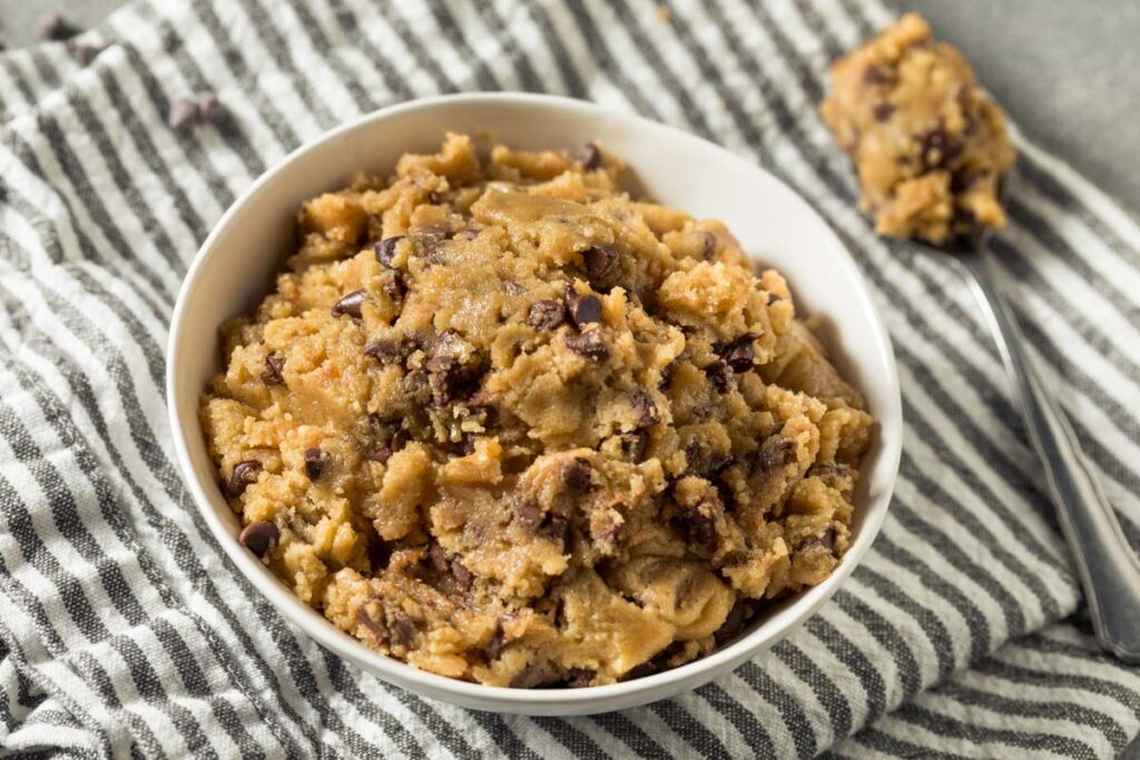 Close up of chocolate chip cookie dough inside of a bowl - Nestlé Edible Chocolate Chip Cookie Dough