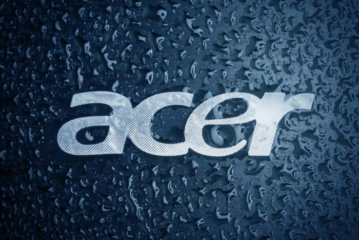 Close up of water drops on the Acer logo.