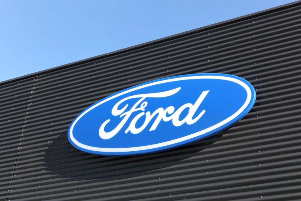 Close up of Ford logo on exterior of a building - class action