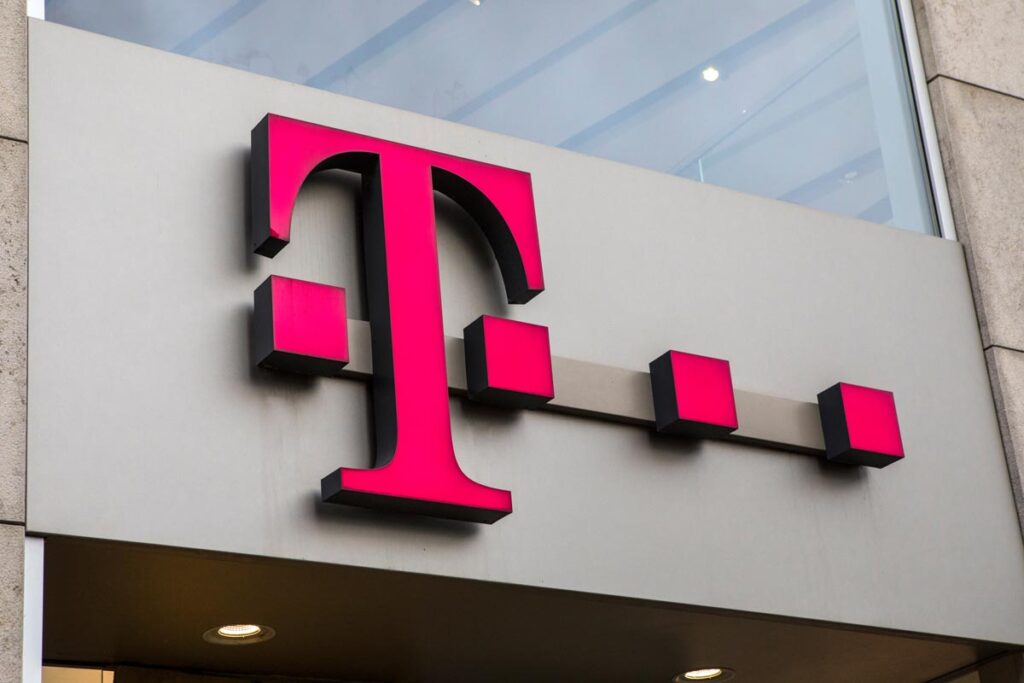 The T-Mobile logo above the entrance to one of their stores, representing the Experian and T-Mobile data breach class action settlement.