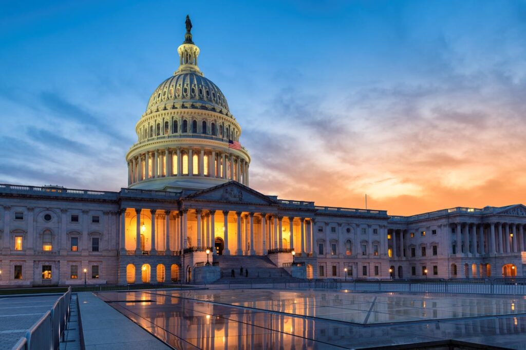 The United States Capitol building at sunset.