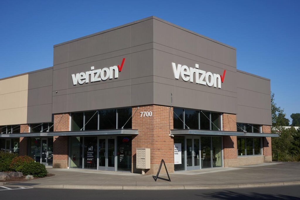 Exterior of a Verizon store against a blue sky.