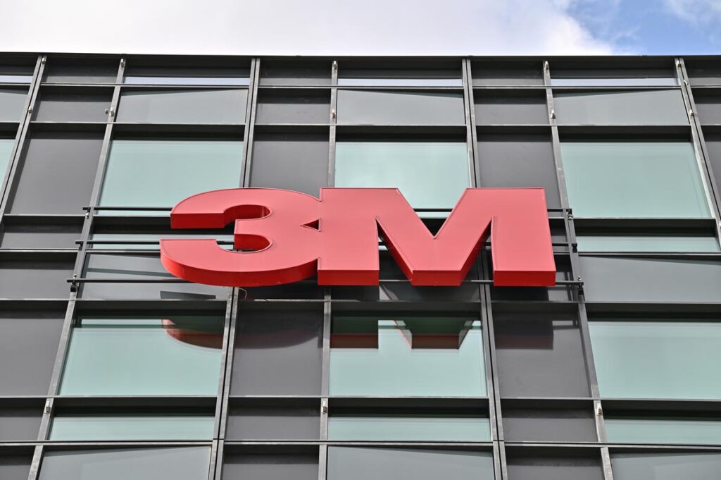 A wall sign for the American industrial conglomerate 3M on an office building.