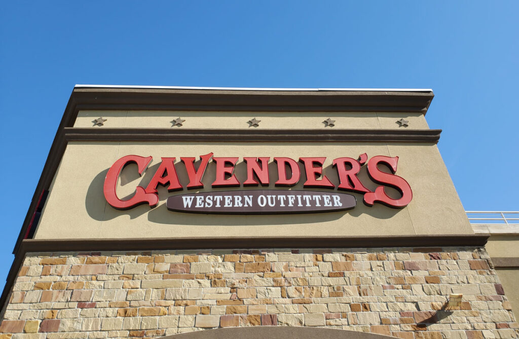 Cavenders signage against a bright blue sky.