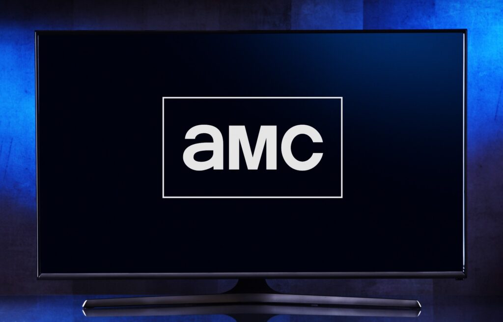 The AMC logo is seen on a TV, representing the AMC class action lawsuit.