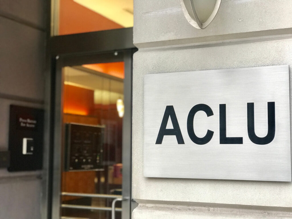 Close up of ACLU signage.