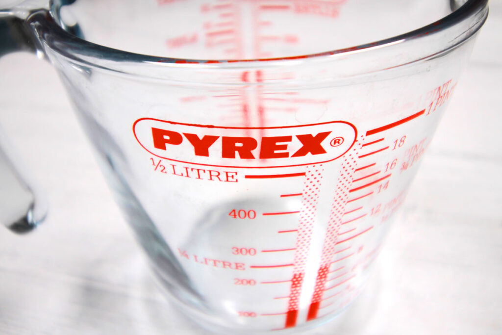 Close up of Pyrex half liter measuring jug container.