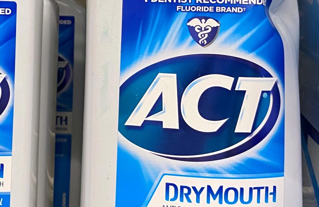 Close up of the ACT logo on a product inside a grocery store - dry-mouth lozenges