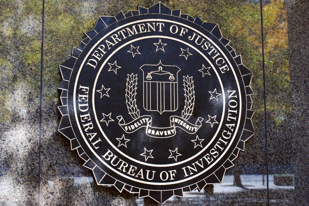 Close up of FBI signage on the side of a building.