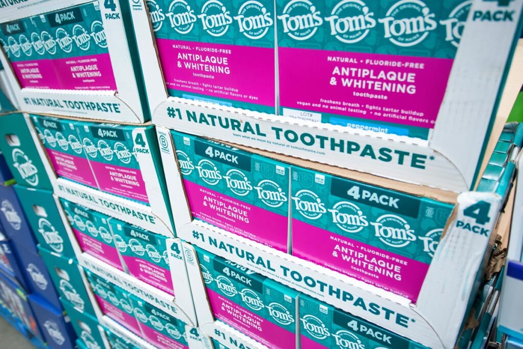 A view of several packages of Tom's of Maine anti-plaque toothpaste on display at a local big box grocery store.