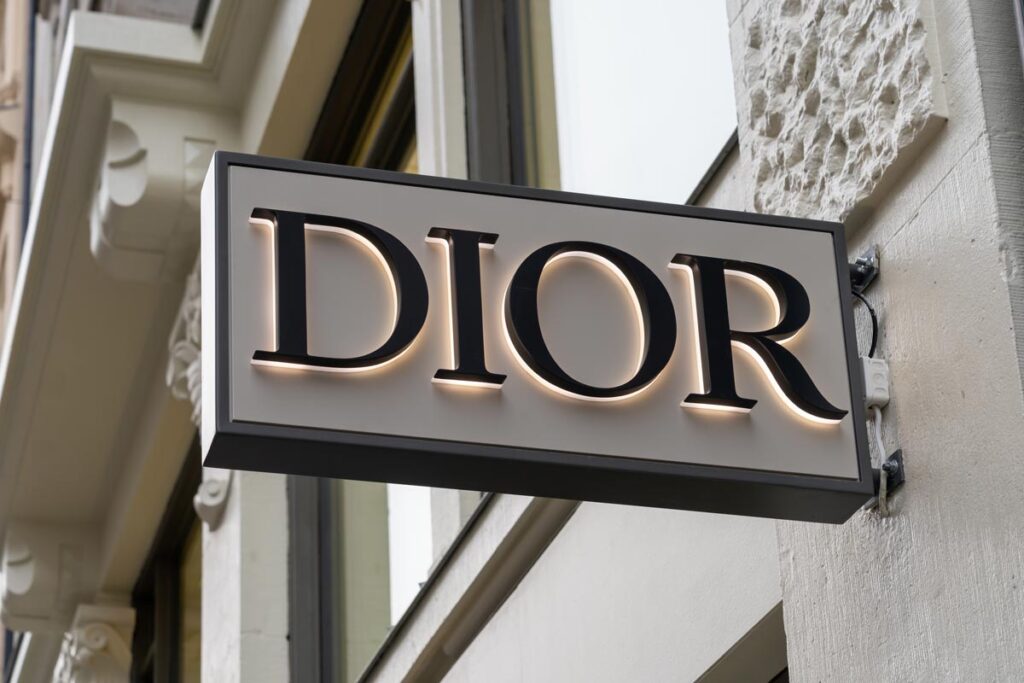 Close up of Dior store projecting sign on the building.