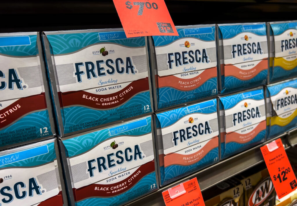 Close up of Fresca packages for sale on a grocery store shelf.