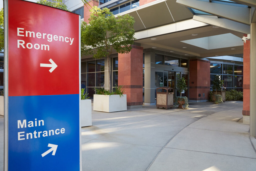 Main Entrance Of Modern Hospital Building With Signs, representing the Katherine Shaw Bethea Hospital data breach settlement.