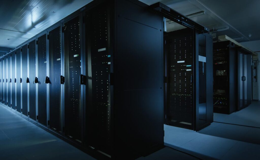 Interior of a server room with server racks, representing the Electromed data breach settlement.