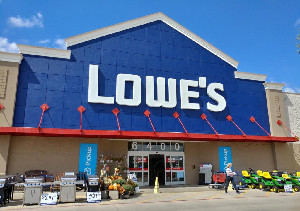 Entrace to a Lowe's location against a blue sky.