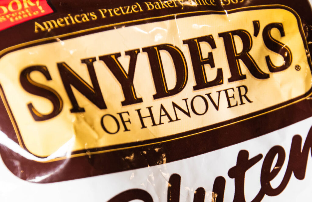 Close up of Snyder's of Hanover logo, representing the Snyder's whole grain false advertising class action lawsuit.