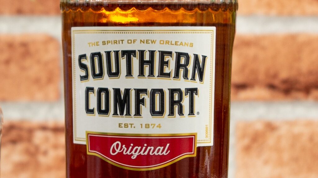 Close up of Mini bottle of Southern Comfort label