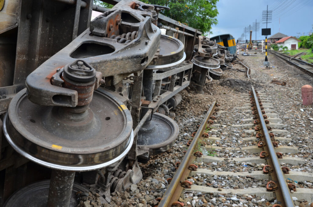 Close-up of train derailing