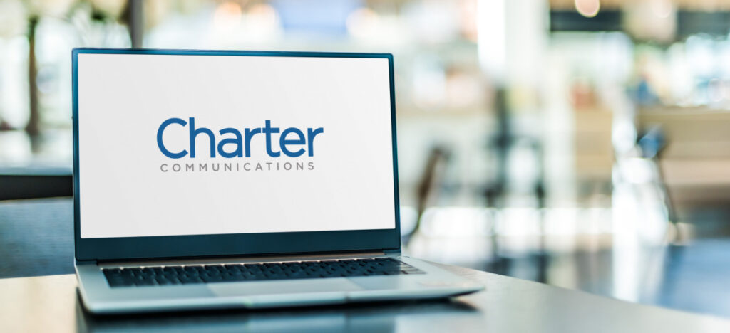 Charter Communications logo on laptop