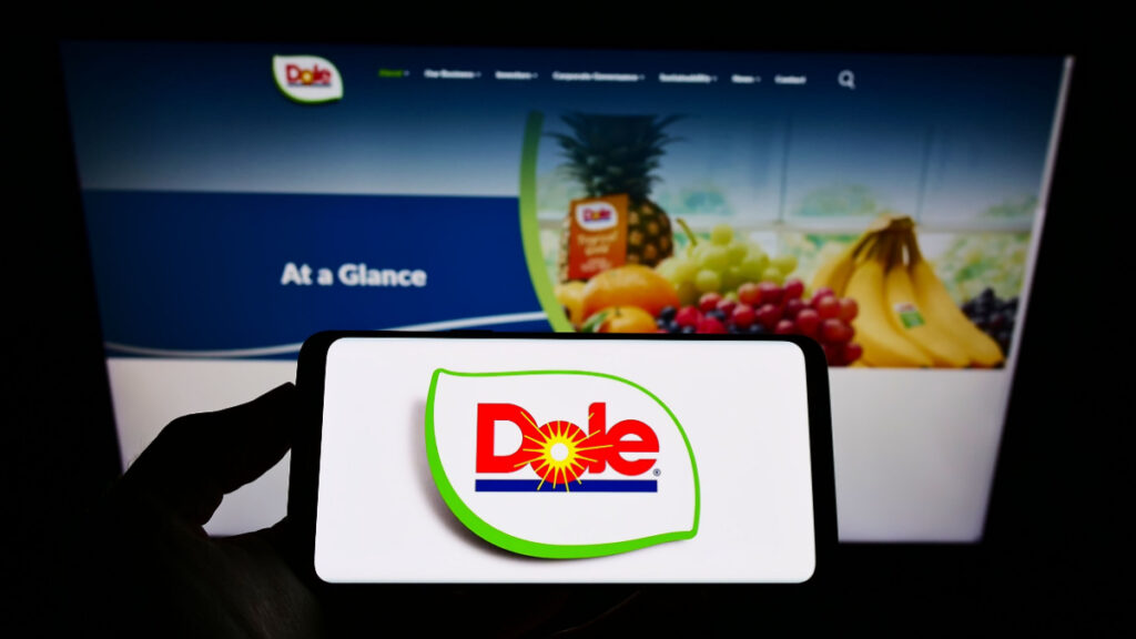 Dole logo on cellphone with the Dole homepage in background