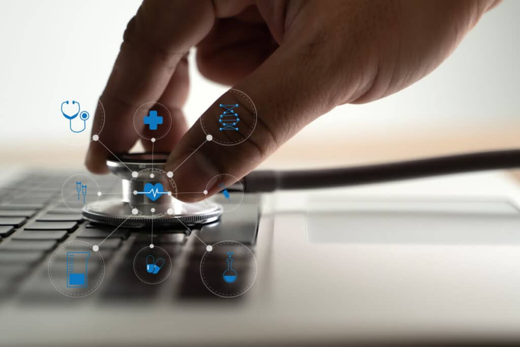 A stethoscope listening to a computer, representing healthcare data breaches