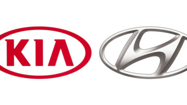 Kia and Hyundai logos side by side.