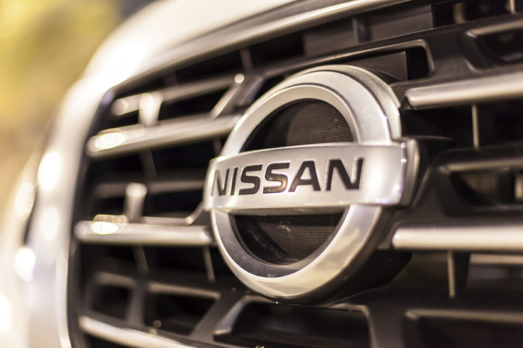 Close up shot of Nissan emblem