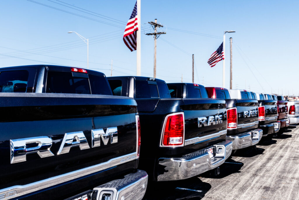Tailgails of Dodge Rams lined up, representing the Ram defect class action.