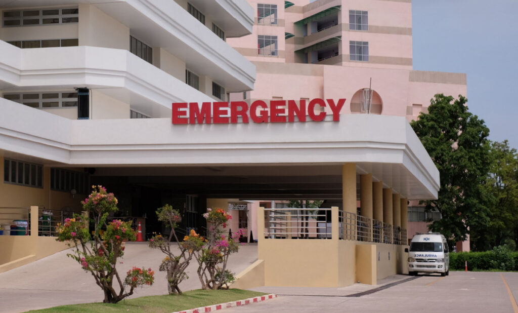 Main Entrance Of Modern Hospital Building With Signs representing the Baptist Emergency Hospital class action lawsuit settlement.