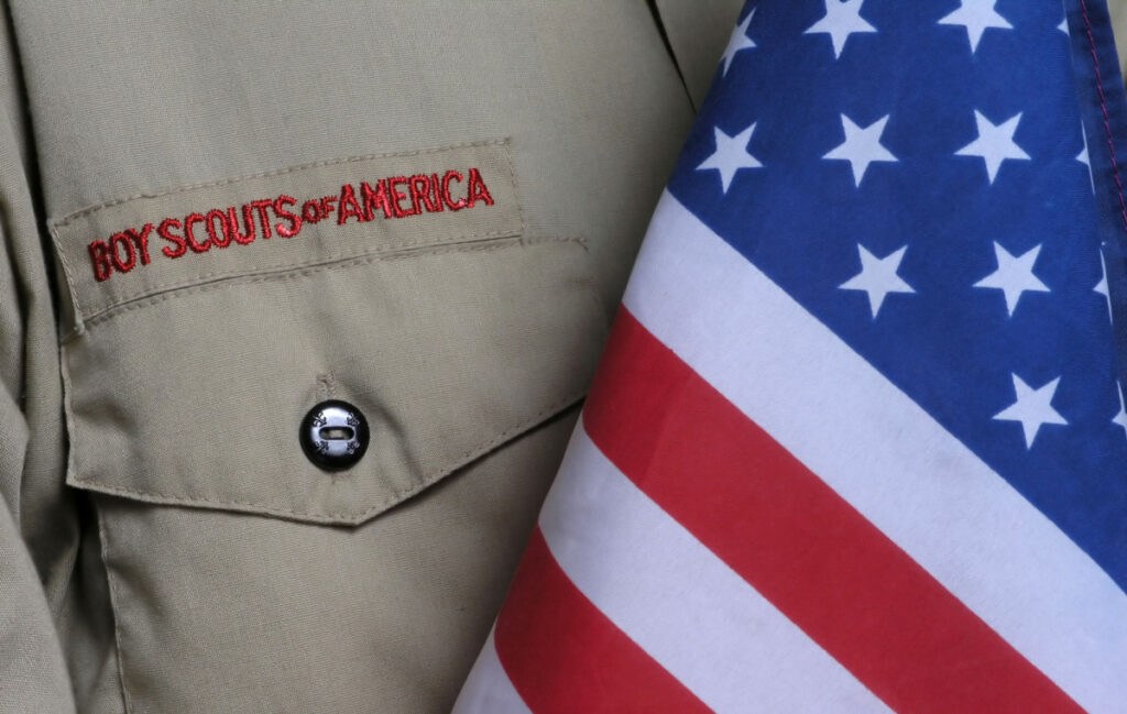 An American flag & a Boy Scouts uniform
